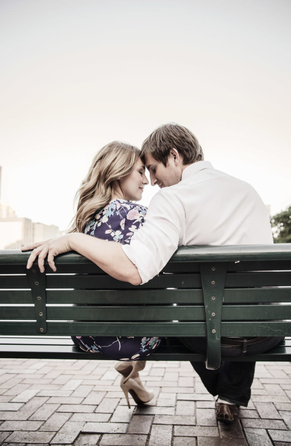 houston downtown engagement portrait on bench by steve lee photography