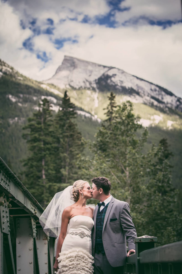 banff canada wedding by steve lee photography bride and groom portrait on bridge