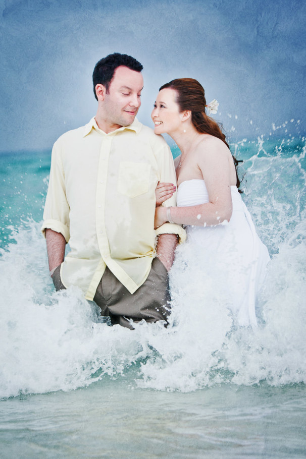 playa del carmen mexico wedding by steve lee photography bride and groom in water