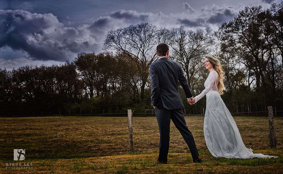 story wedding creative editorial portait by the fence at pecan springs by steve lee photography