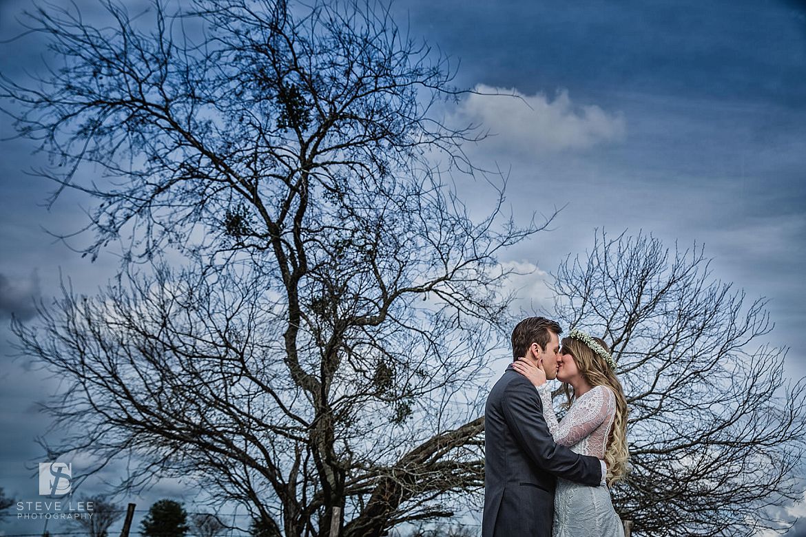 story wedding creative editorial portait by the tree at pecan springs by steve lee photography